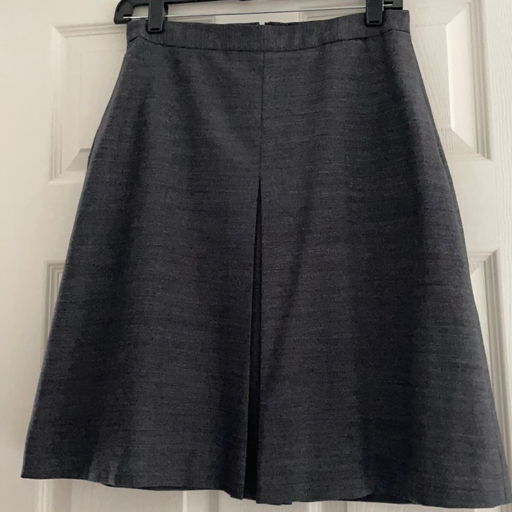 Dark gray lined skirt with pleat in front
